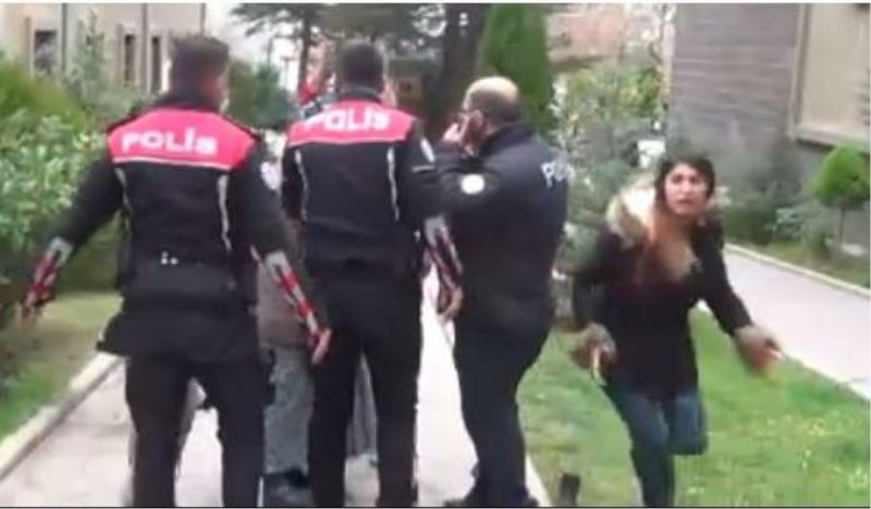 Biçakla kovalayan kocasini unutup gazetecilere saldirdilar.